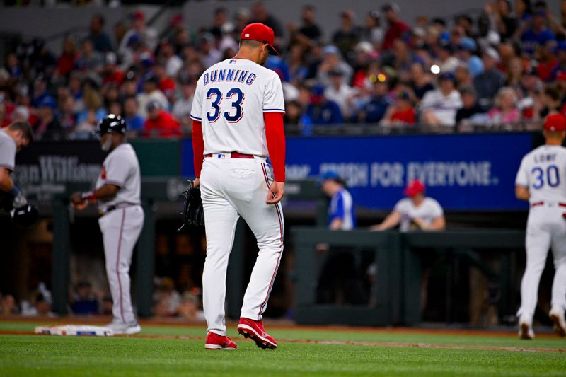 May 16, 2023; Arlington, Texas, USA; Texas Rangers starting pitcher Dane Dunning (33) walks off the field after he pitches against the Atlanta Braves during the third inning at Globe Life Field. Mandatory Credit: Jerome Miron-USA TODAY Sports