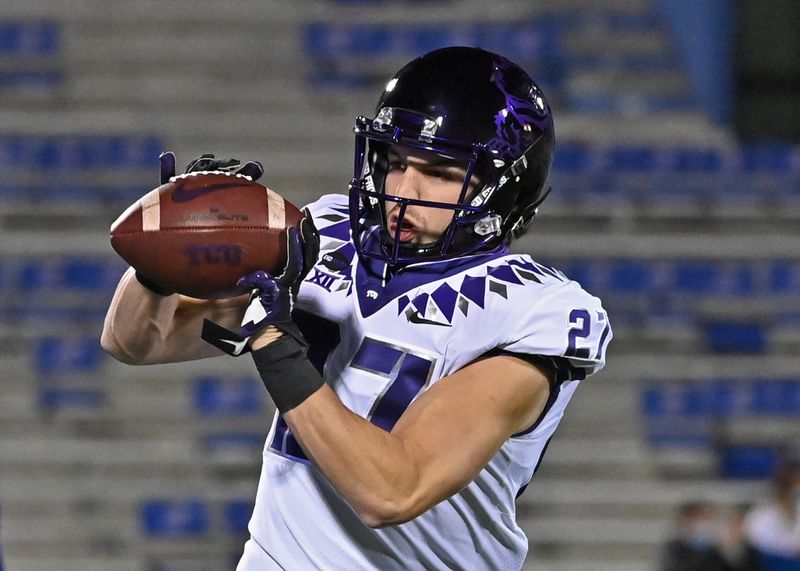 Nov 28, 2020; Lawrence, Kansas, USA; TCU Horned Frogs wide receiver Jack Heathcott (27) catches a pass during pre-game workouts, prior to a game against the Kansas Jayhawks at David Booth Kansas Memorial Stadium. Mandatory Credit: Peter Aiken-USA TODAY Sports