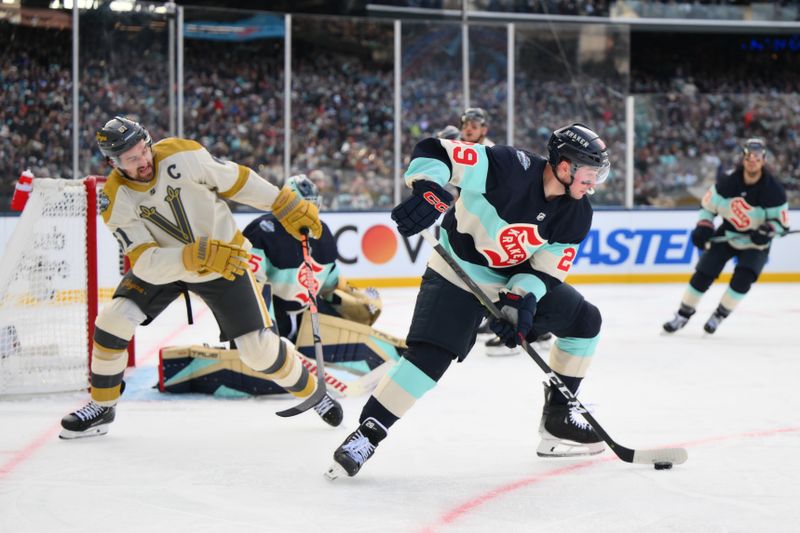 Jan 1, 2024; Seattle, Washington, USA; Seattle Kraken defenseman Vince Dunn (29) plays the puck away from Vegas Golden Knights right wing Mark Stone (61) during the 3rd period in the 2024 Winter Classic ice hockey game at T-Mobile Park. Mandatory Credit: Steven Bisig-USA TODAY Sports