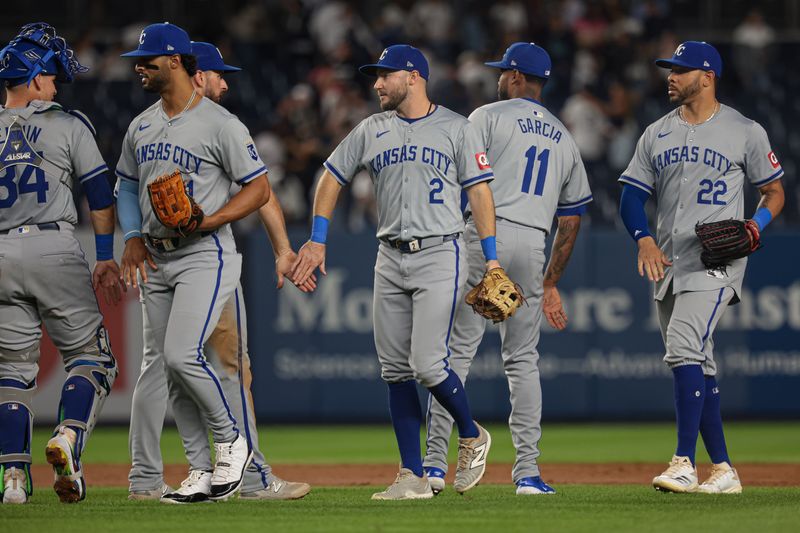 Sep 10, 2024; Bronx, New York, USA; Kansas City Royals center fielder Garrett Hampson (2) celebrates with teammates after defeating the New York Yankees at Yankee Stadium. Mandatory Credit: Vincent Carchietta-Imagn Images