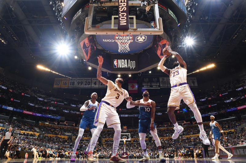 LOS ANGELES, CA - MARCH 10: LeBron James #23 of the Los Angeles Lakers drives to the basket during the game against the Minnesota Timberwolves on March 10, 2024 at Crypto.Com Arena in Los Angeles, California. NOTE TO USER: User expressly acknowledges and agrees that, by downloading and/or using this Photograph, user is consenting to the terms and conditions of the Getty Images License Agreement. Mandatory Copyright Notice: Copyright 2024 NBAE (Photo by Adam Pantozzi/NBAE via Getty Images)