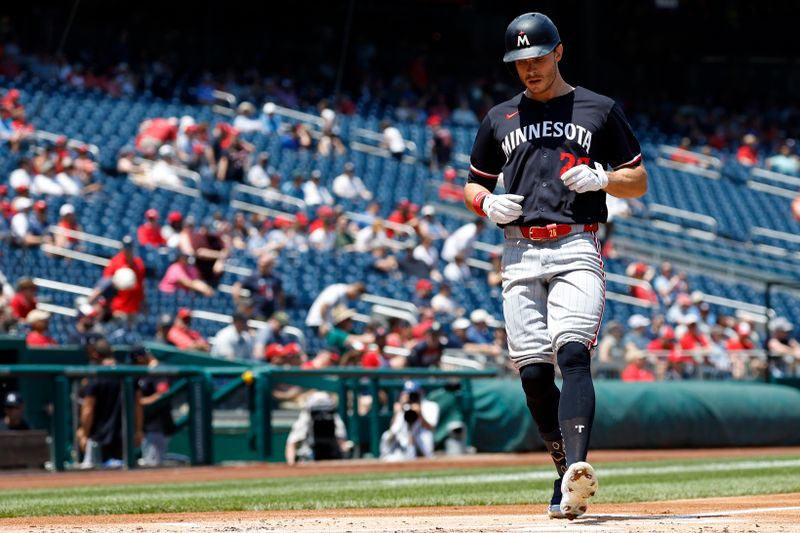 May 22, 2024; Washington, District of Columbia, USA; Minnesota Twins outfielder Max Kepler (26) touches home plate after hitting a home run against the Washington Nationals during the second inning at Nationals Park. Mandatory Credit: Geoff Burke-USA TODAY Sports