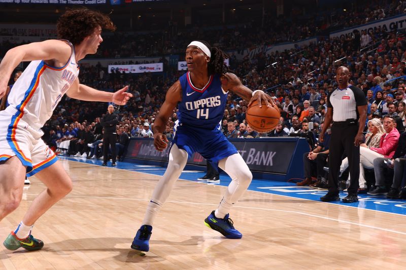 OKLAHOMA CITY, OK - FEBRUARY 22: Terance Mann #14 of the LA Clippers handles the ball during the game against the Oklahoma City Thunder on February 22SF, 2024 at Paycom Arena in Oklahoma City, Oklahoma. NOTE TO USER: User expressly acknowledges and agrees that, by downloading and or using this photograph, User is consenting to the terms and conditions of the Getty Images License Agreement. Mandatory Copyright Notice: Copyright 2024 NBAE (Photo by Zach Beeker/NBAE via Getty Images)