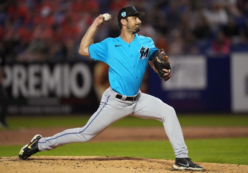 Feb 25, 2023; Port St. Lucie, Florida, USA;  Miami Marlins relief pitcher JT Chargois (84) pitches against the New York Mets in the third inning at Clover Park. Mandatory Credit: Jim Rassol-USA TODAY Sports