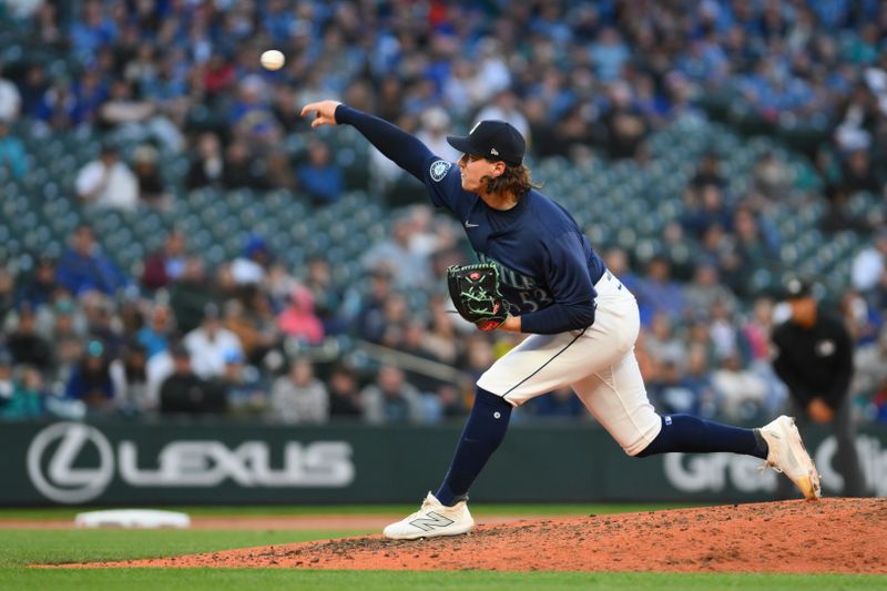 Jun 12, 2024; Seattle, Washington, USA; Seattle Mariners relief pitcher Mike Baumann (53) pitches to the Chicago White Sox during the ninth inning at T-Mobile Park. Mandatory Credit: Steven Bisig-USA TODAY Sports