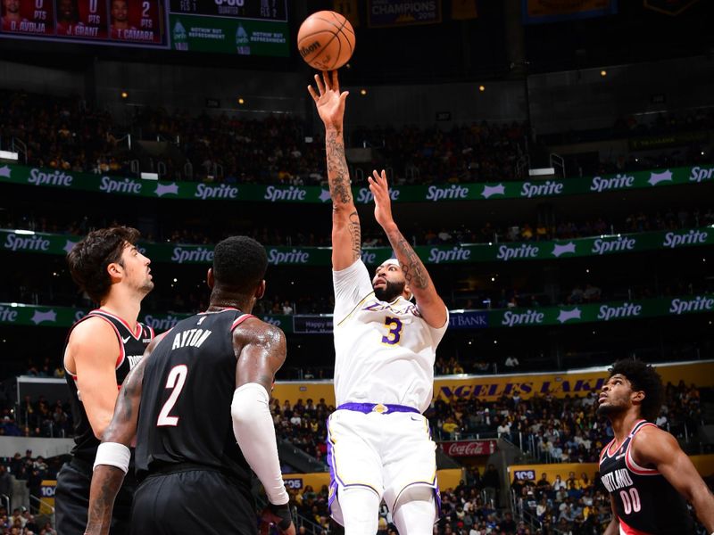 LOS ANGELES, CA - DECEMBER 8: Anthony Davis #3 of the Los Angeles Lakers drives to the basket during the game against the Portland Trail Blazers on December 8, 2024 at Crypto.Com Arena in Los Angeles, California. NOTE TO USER: User expressly acknowledges and agrees that, by downloading and/or using this Photograph, user is consenting to the terms and conditions of the Getty Images License Agreement. Mandatory Copyright Notice: Copyright 2024 NBAE (Photo by Adam Pantozzi/NBAE via Getty Images)