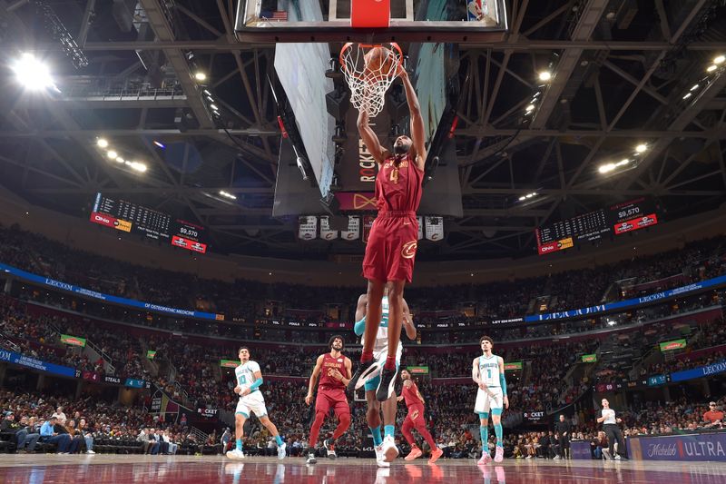 CLEVELAND, OH - JANUARY 5: Evan Mobley #4 of the Cleveland Cavaliers dunks the ball during the game against the Charlotte Hornets on January 5, 2025 at Rocket Mortgage FieldHouse in Cleveland, Ohio. NOTE TO USER: User expressly acknowledges and agrees that, by downloading and/or using this Photograph, user is consenting to the terms and conditions of the Getty Images License Agreement. Mandatory Copyright Notice: Copyright 2025 NBAE (Photo by David Liam Kyle/NBAE via Getty Images)