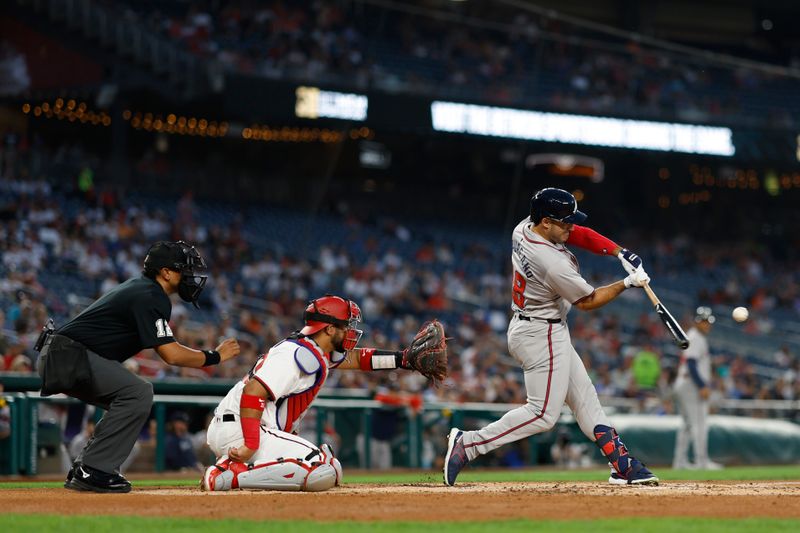 Sep 10, 2024; Washington, District of Columbia, USA; Atlanta Braves outfielder Ramón Laureano (18) hits a two run double against the Washington Nationals during the third inning at Nationals Park. Mandatory Credit: Geoff Burke-Imagn Images