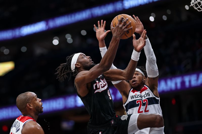 WASHINGTON, DC - FEBRUARY 26: Jerami Grant #9 of the Portland Trail Blazers goes to the basket against Richaun Holmes #22 of the Washington Wizards during the second half at Capital One Arena on February 26, 2025 in Washington, DC. NOTE TO USER: User expressly acknowledges and agrees that, by downloading and or using this photograph, User is consenting to the terms and conditions of the Getty Images License Agreement. (Photo by Scott Taetsch/Getty Images)