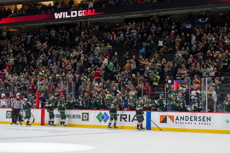 Nov 14, 2024; Saint Paul, Minnesota, USA; Minnesota Wild left wing Kirill Kaprizov (97) is congratulated by the Wild bench after scoring on the Montreal Canadiens in the third period at Xcel Energy Center. Mandatory Credit: Matt Blewett-Imagn Images