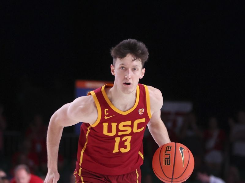 Nov 25, 2022; Paradise Island, BAHAMAS; USC Trojans guard Drew Peterson (13) dribbles the ball during the second half against the Wisconsin Badgers at Imperial Arena. Mandatory Credit: Kevin Jairaj-USA TODAY Sports