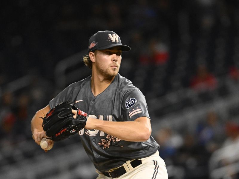 Sep 9, 2023; Washington, District of Columbia, USA; Washington Nationals starting pitcher Jake Irvin (74) throws to the Los Angeles Dodgers during the second inning at Nationals Park. Mandatory Credit: Brad Mills-USA TODAY Sports