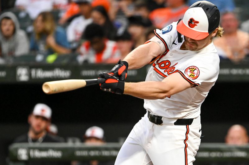 Sep 4, 2024; Baltimore, Maryland, USA;  Baltimore Orioles shortstop Gunnar Henderson (2) hits a third inning single against the Chicago White Sox at Oriole Park at Camden Yards. Mandatory Credit: Tommy Gilligan -Imagn Images