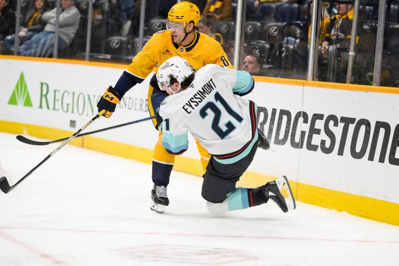 Mar 6, 2025; Nashville, Tennessee, USA;  Seattle Kraken center Michael Eyssimont (21) takes a shot on goal against the Nashville Predators during the second period at Bridgestone Arena. Mandatory Credit: Steve Roberts-Imagn Images