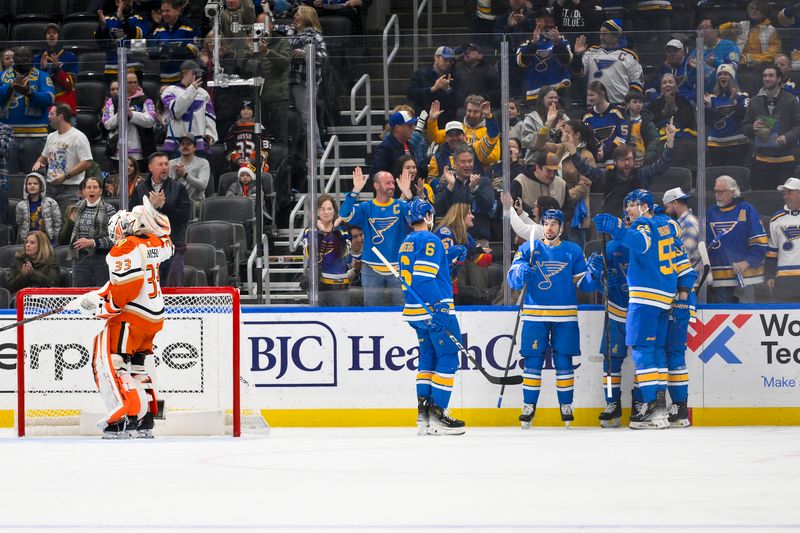 Dec 1, 2025; St. Louis, Missouri, USA; St. Louis Blues right wing Jordan Kyrou (25) is congratulated by teammates after scoring against the Anaheim Ducks during the first period at Enterprise Center. Mandatory Credit: Jeff Curry-Imagn Images