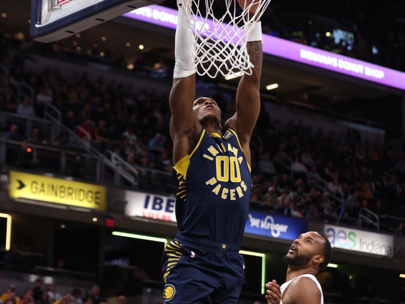 INDIANAPOLIS, IN - JANUARY 14: Bennedict Mathurin #00 of the Indiana Pacers dunks the ball during the game against the Cleveland Cavaliers on January 14, 2025 at Gainbridge Fieldhouse in Indianapolis, Indiana. NOTE TO USER: User expressly acknowledges and agrees that, by downloading and or using this Photograph, user is consenting to the terms and conditions of the Getty Images License Agreement. Mandatory Copyright Notice: Copyright 2025 NBAE (Photo by Pepper Robinson/NBAE via Getty Images)