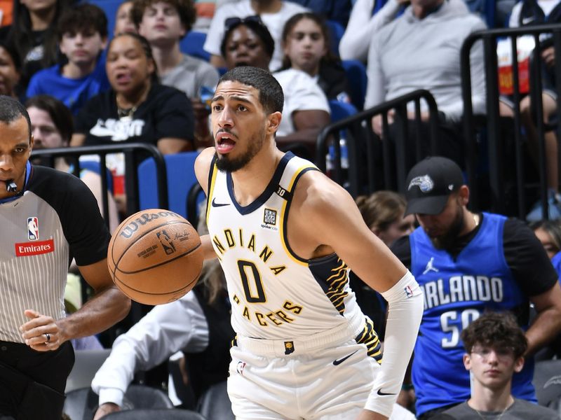 ORLANDO, FL - MARCH 10: Tyrese Haliburton #0 of the Indiana Pacers handles the ball during the game  on March 10, 2024 at Amway Center in Orlando, Florida. NOTE TO USER: User expressly acknowledges and agrees that, by downloading and or using this photograph, User is consenting to the terms and conditions of the Getty Images License Agreement. Mandatory Copyright Notice: Copyright 2024 NBAE (Photo by Fernando Medina/NBAE via Getty Images)