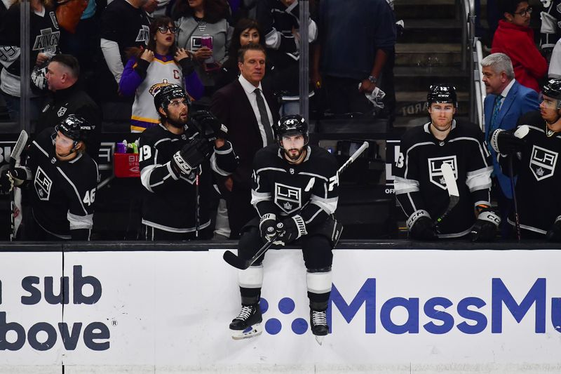 Apr 29, 2023; Los Angeles, California, USA; Los Angeles Kings and center Phillip Danault (24) react following the loss against the Edmonton Oilers in game six of the first round of the 2023 Stanley Cup Playoffs at Crypto.com Arena. Mandatory Credit: Gary A. Vasquez-USA TODAY Sports