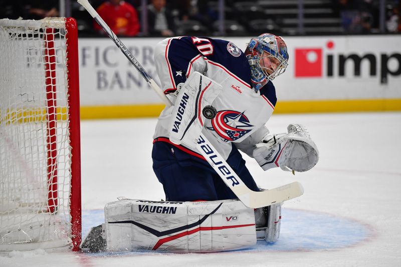 Feb 21, 2024; Anaheim, California, USA; Columbus Blue Jackets goaltender Daniil Tarasov (40) blocks a shot against the Anaheim Ducks during the first period at Honda Center. Mandatory Credit: Gary A. Vasquez-USA TODAY Sports