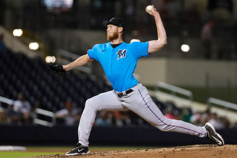 Mar 10, 2023; West Palm Beach, Florida, USA; Miami Marlins relief pitcher A.J. Puk (35) delivers a pitch during the fifth inning against the Washington Nationals at The Ballpark of the Palm Beaches. Mandatory Credit: Sam Navarro-USA TODAY Sports