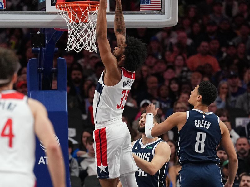 DALLAS, TX - FEBRUARY 12: Marvin Bagley III #35 of the Washington Wizards drives to the basket during the game against the Dallas Mavericks on February 12, 2024 at the American Airlines Center in Dallas, Texas. NOTE TO USER: User expressly acknowledges and agrees that, by downloading and or using this photograph, User is consenting to the terms and conditions of the Getty Images License Agreement. Mandatory Copyright Notice: Copyright 2024 NBAE (Photo by Glenn James/NBAE via Getty Images)