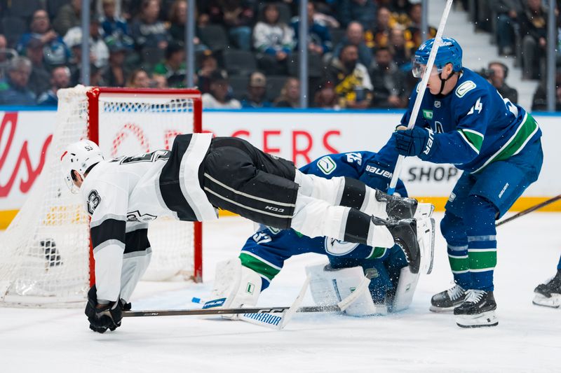 Apr 14, 2026; Vancouver, British Columbia, CAN; Vancouver Canucks forward Aatu Raty (54) watches as Los Angeles Kings forward Jared Wright (53) collides with goalie Kevin Lankinen (32) in the third period at Rogers Arena. Mandatory Credit: Bob Frid-Imagn Images Apr 14, 2026; Vancouver, British Columbia, CAN; Vancouver Canucks forward Aatu Raty (54) watches as Los Angeles Kings forward Jared Wright (53) collides with goalie Kevin Lankinen (32) in the third period at Rogers Arena. Mandatory Credit: Bob Frid-Imagn Images