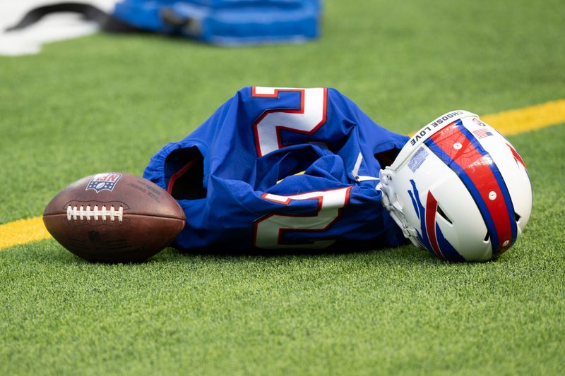 Buffalo Bills place kicker Tyler Bass left his jersey, helmed and pads on the sideline before playing the Los Angeles Rams during an NFL football game Thursday, Sept. 8, 2021, in Inglewood, Calif. (AP Photo/John McCoy)