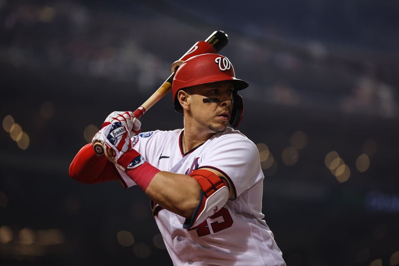 Jun 7, 2023; Washington, District of Columbia, USA; Washington Nationals designated hitter Joey Meneses (45) warms up against the Arizona Diamondbacks during the eighth inning at Nationals Park. Mandatory Credit: Scott Taetsch-USA TODAY Sports