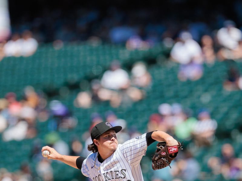 Jun 5, 2024; Denver, Colorado, USA; Colorado Rockies relief pitcher Victor Vodnik (38) delivers a pitch during the fifth inning against the Cincinnati Reds at Coors Field. Mandatory Credit: Andrew Wevers-USA TODAY Sports