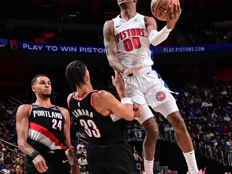 DETROIT, MI - JANUARY 06:  Ron Holland II #00 of the Detroit Pistons shoots the ball during the game against the Portland Trail Blazers on January 06, 2025 at Little Caesars Arena in Detroit, Michigan. NOTE TO USER: User expressly acknowledges and agrees that, by downloading and/or using this photograph, User is consenting to the terms and conditions of the Getty Images License Agreement. Mandatory Copyright Notice: Copyright 2025 NBAE (Photo by Chris Schwegler/NBAE via Getty Images)