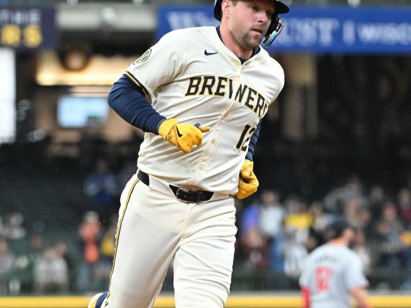 Apr 3, 2024; Milwaukee, Wisconsin, USA; Milwaukee Brewers first baseman Rhys Hoskins (12) rounds the bases after hitting a home run against the Minnesota Twins in the fourth inning at American Family Field. Mandatory Credit: Michael McLoone-USA TODAY Sports