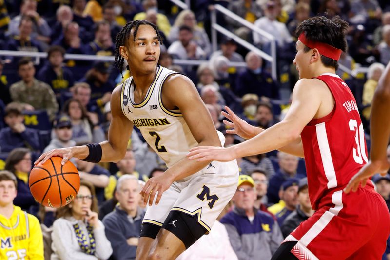 Feb 8, 2023; Ann Arbor, Michigan, USA;  Michigan Wolverines guard Kobe Bufkin (2) dribbles defended by Nebraska Cornhuskers guard Keisei Tominaga (30) in the first half at Crisler Center. Mandatory Credit: Rick Osentoski-USA TODAY Sports