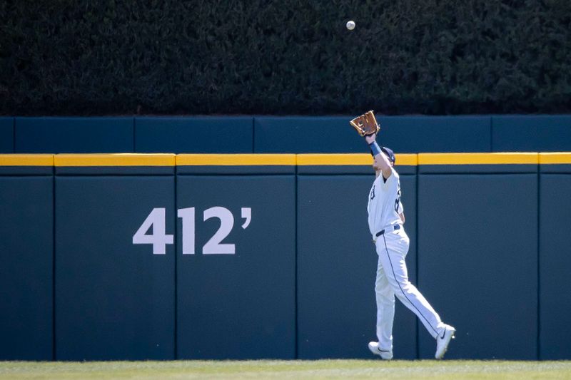 Apr 26, 2024; Detroit, Michigan, USA; Detroit Tigers outfielder Mark Canha (21) runs down a fly ball for an out against the Kansas City Royals at Comerica Park. Mandatory Credit: David Reginek-USA TODAY Sports