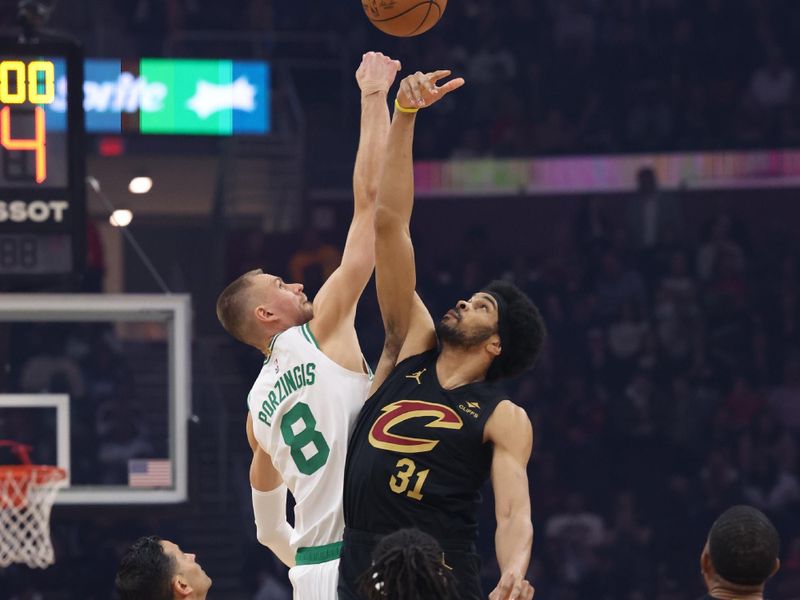 CLEVELAND, OH - MARCH 5: The opening tip off during the game between the Jarrett Allen #31 of the Cleveland Cavaliers and the Kristaps Porzingis #8 of the Boston Celtics on March 5, 2024 at Rocket Mortgage FieldHouse in Cleveland, Ohio. NOTE TO USER: User expressly acknowledges and agrees that, by downloading and/or using this Photograph, user is consenting to the terms and conditions of the Getty Images License Agreement. Mandatory Copyright Notice: Copyright 2024 NBAE (Photo by Lauren Leigh Bacho /NBAE via Getty Images)