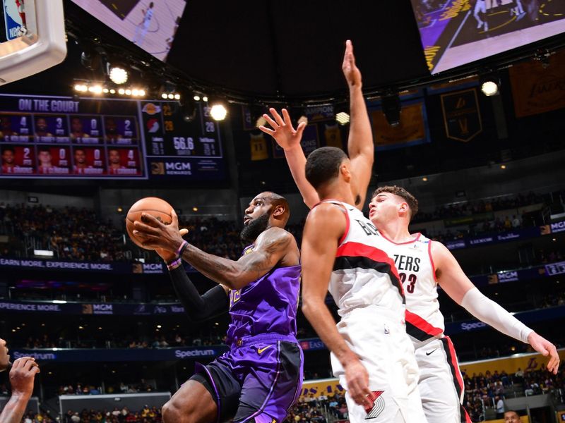 LOS ANGELES, CA - JANUARY 2: LeBron James #23 of the Los Angeles Lakers drives to the basket during the game against the Portland Trail Blazers on January 2, 2025 at Crypto.Com Arena in Los Angeles, California. NOTE TO USER: User expressly acknowledges and agrees that, by downloading and/or using this Photograph, user is consenting to the terms and conditions of the Getty Images License Agreement. Mandatory Copyright Notice: Copyright 2025 NBAE (Photo by Adam Pantozzi/NBAE via Getty Images)