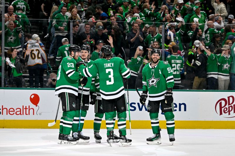 May 9, 2024; Dallas, Texas, USA; Dallas Stars defenseman Esa Lindell (23) and center Roope Hintz (24) and center Wyatt Johnston (53) and defenseman Chris Tanev (3) and center Tyler Seguin (91) celebrates after Lindell scores an empty net goal against the Colorado Avalanche during the third period in game two of the second round of the 2024 Stanley Cup Playoffs at American Airlines Center. Mandatory Credit: Jerome Miron-USA TODAY Sports