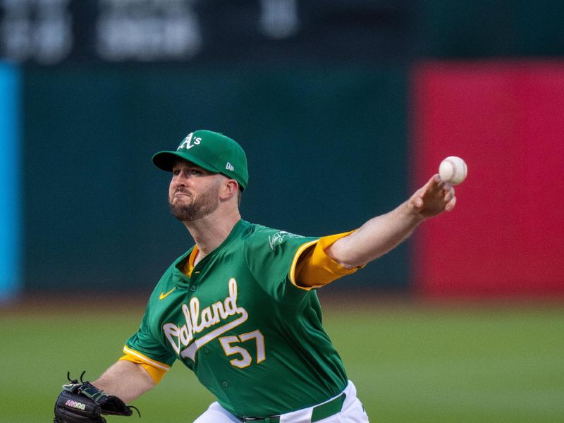 Apr 30, 2024; Oakland, California, USA;  Oakland Athletics pitcher Alex Wood (57) delivers a pitch against the Pittsburgh Pirates during the first inning at Oakland-Alameda County Coliseum. Mandatory Credit: Neville E. Guard-USA TODAY Sports