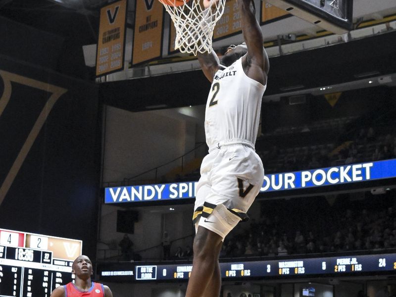 Dec 3, 2025; Nashville, Tennessee, USA;  Vanderbilt Commodores guard Duke Miles (2) dunks against the Southern Methodist University Mustangs during the first half at Memorial Gymnasium. Mandatory Credit: Steve Roberts-Imagn Images