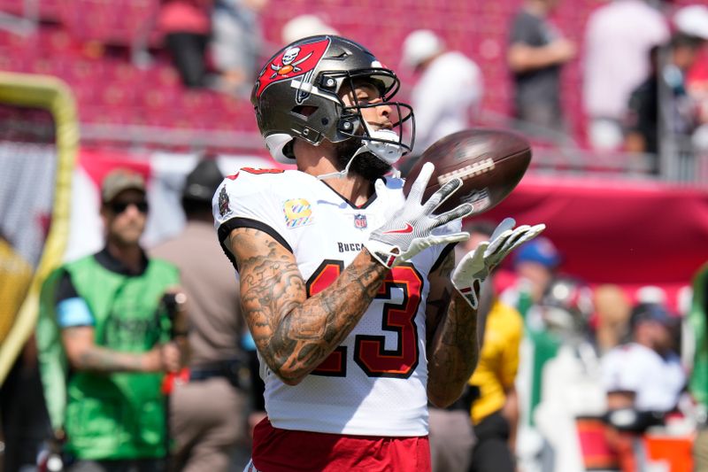 Tampa Bay Buccaneers' Mike Evans warms up before an NFL football game against the Philadelphia Eagles, Sunday, Sept. 29, 2024, in Tampa, Fla. (AP Photo/Chris O'Meara)