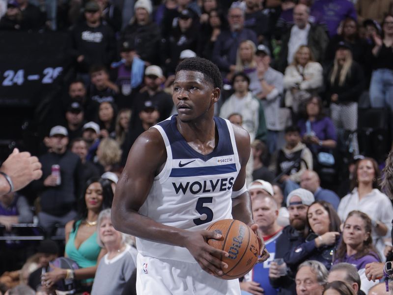 SACRAMENTO, CA - NOVEMBER 15: Anthony Edwards #5 of the Minnesota Timberwolves looks to pass the ball during the game against the Sacramento Kings during the Emirates NBA Cup game on November 15, 2024 at Golden 1 Center in Sacramento, California. NOTE TO USER: User expressly acknowledges and agrees that, by downloading and or using this Photograph, user is consenting to the terms and conditions of the Getty Images License Agreement. Mandatory Copyright Notice: Copyright 2024 NBAE (Photo by Rocky Widner/NBAE via Getty Images)