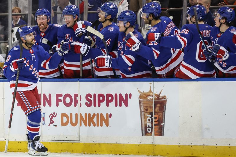 Feb 28, 2026; New York, New York, USA;  New York Rangers center Vincent Trocheck (16) celebrates with his teammates after scoring a goal during a shootout against the Pittsburgh Penguins at Madison Square Garden. Mandatory Credit: Wendell Cruz-Imagn Images