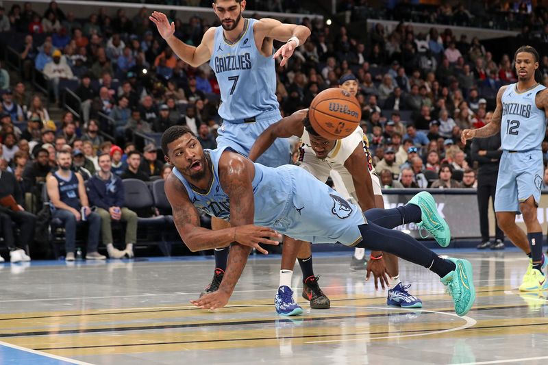 MEMPHIS, TENNESSEE - NOVEMBER 29: Marcus Smart #36 of the Memphis Grizzlies passes the ball during the second half against the New Orleans Pelicans of an Emirates NBA Cup game at FedExForum on November 29, 2024 in Memphis, Tennessee. NOTE TO USER: User expressly acknowledges and agrees that, by downloading and or using this photograph, User is consenting to the terms and conditions of the Getty Images License Agreement. (Photo by Justin Ford/Getty Images)