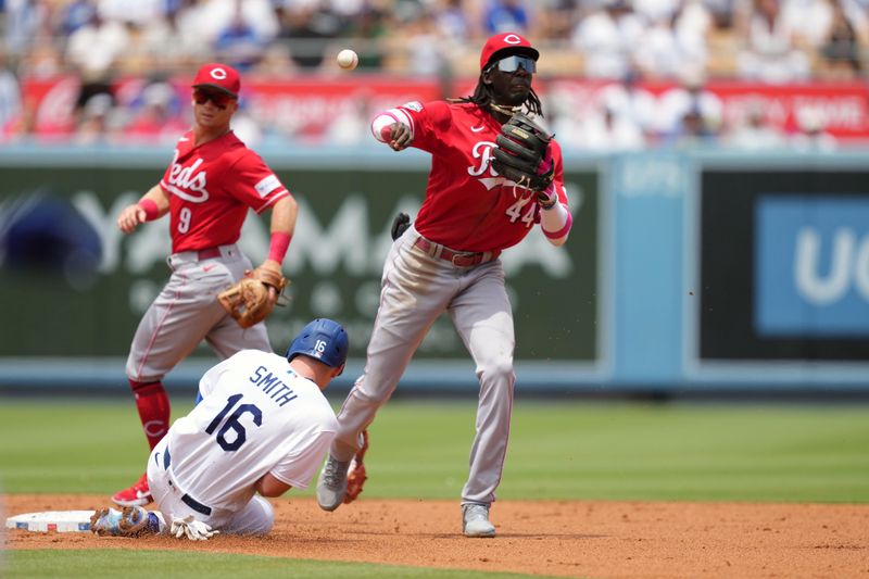 Jul 30, 2023; Los Angeles, California, USA; Cincinnati Reds third baseman Elly De La Cruz (44) forces out Los Angeles Dodgers catcher Will Smith (16) out at second base in the first inning at Dodger Stadium. Mandatory Credit: Kirby Lee-USA TODAY Sports