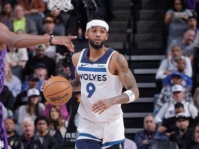 SACRAMENTO, CA - DECEMBER 23: Nickeil Alexander-Walker #9 of the Minnesota Timberwolves brings the ball up court against the Sacramento Kings on December 23, 2023 at Golden 1 Center in Sacramento, California. NOTE TO USER: User expressly acknowledges and agrees that, by downloading and or using this Photograph, user is consenting to the terms and conditions of the Getty Images License Agreement. Mandatory Copyright Notice: Copyright 2023 NBAE (Photo by Rocky Widner/NBAE via Getty Images)