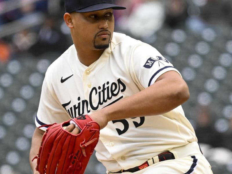 Apr 23, 2023; Minneapolis, Minnesota, USA;  Minnesota Twins pitcher Jhoan Duran (59) delivers against the Washington Nationals at Target Field. Mandatory Credit: Nick Wosika-USA TODAY Sports