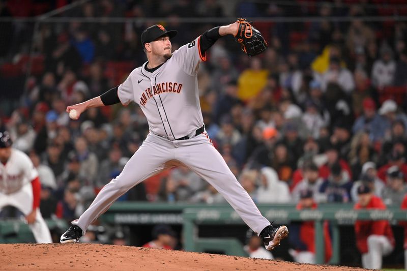 May 1, 2024; Boston, Massachusetts, USA; San Francisco Giants relief pitcher Luke Jackson 
(77) pitches against the Boston Red Sox  during the fifth inning at Fenway Park. Mandatory Credit: Eric Canha-USA TODAY Sports