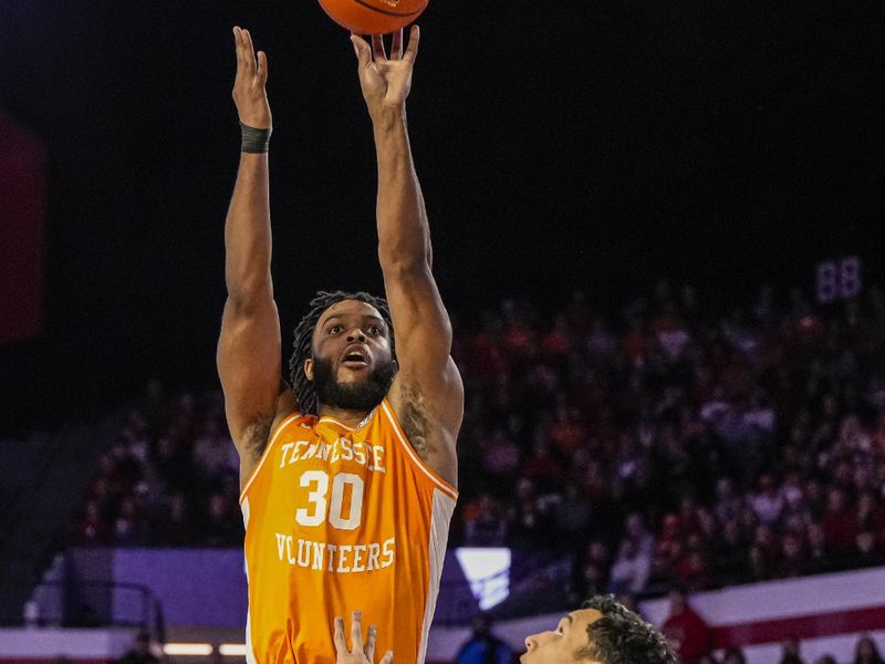 Jan 13, 2024; Athens, Georgia, USA; Tennessee Volunteers guard Josiah-Jordan James (30) shoots over Georgia Bulldogs guard RJ Melendez (15) during the first half at Stegeman Coliseum. Mandatory Credit: Dale Zanine-USA TODAY Sports