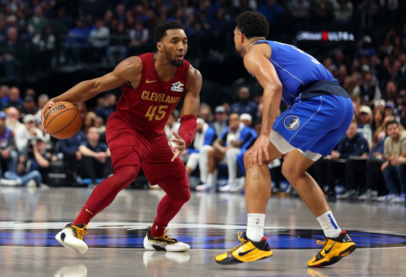 DALLAS, TEXAS - JANUARY 03: Donovan Mitchell #45 of the Cleveland Cavaliers looks to get past Quentin Grimes #5 of the Dallas Mavericks in the second half at American Airlines Center on January 03, 2025 in Dallas, Texas. NOTE TO USER: User expressly acknowledges and agrees that, by downloading and or using this photograph, User is consenting to the terms and conditions of the Getty Images License Agreement. (Photo by Richard Rodriguez/Getty Images)