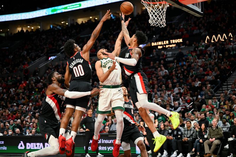 PORTLAND, OREGON - MARCH 11: Derrick White #9 of the Boston Celtics puts up a shot against the Portland Trail Blazers during the second quarter at the Moda Center on March 11, 2024 in Portland, Oregon. NOTE TO USER: User expressly acknowledges and agrees that, by downloading and or using this photograph, User is consenting to the terms and conditions of the Getty Images License Agreement. (Photo by Alika Jenner/Getty Images)