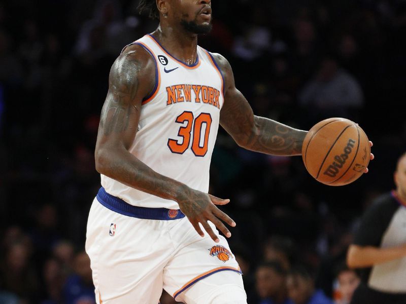 NEW YORK, NEW YORK - OCTOBER 04: Julius Randle #30 of the New York Knicks dribbles during the second half against the Detroit Pistons at Madison Square Garden on October 04, 2022 in New York City. NOTE TO USER: User expressly acknowledges and agrees that, by downloading and or using this photograph, User is consenting to the terms and conditions of the Getty Images License Agreement. (Photo by Sarah Stier/Getty Images)